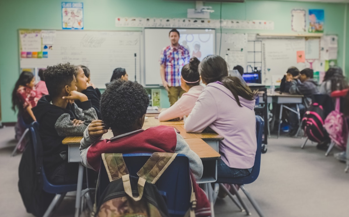 Teacher in a classroom using AI for education