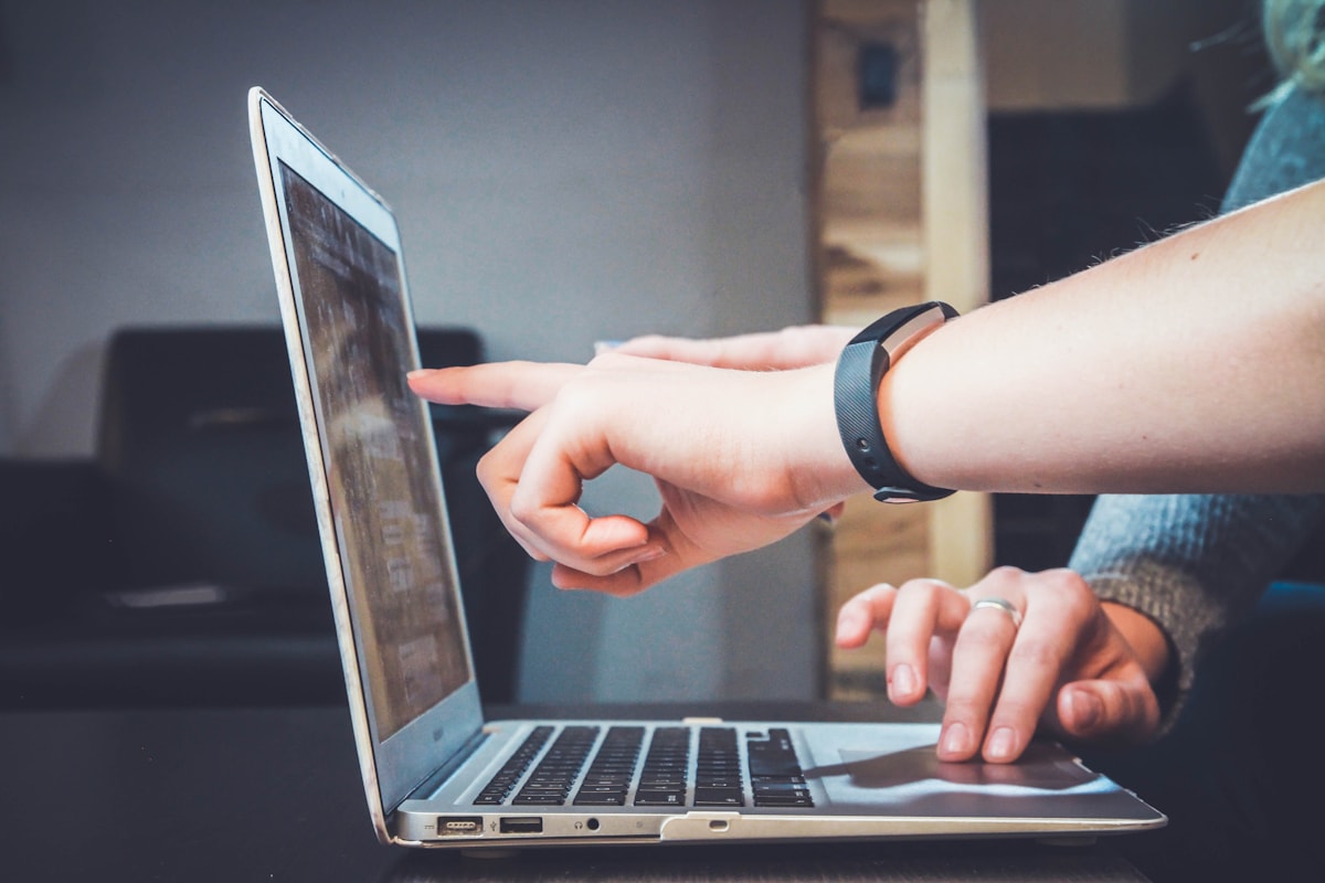 Learner studying AI basics on a laptop
