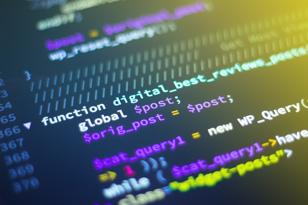 Laptop screen showing programming code